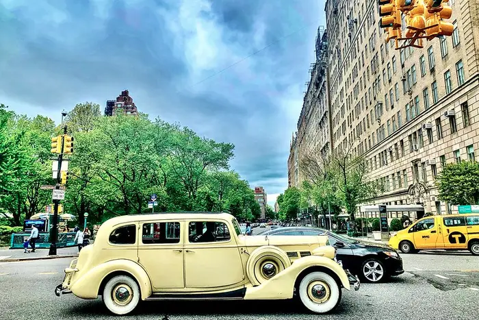 a vintage car parked in Manhattan